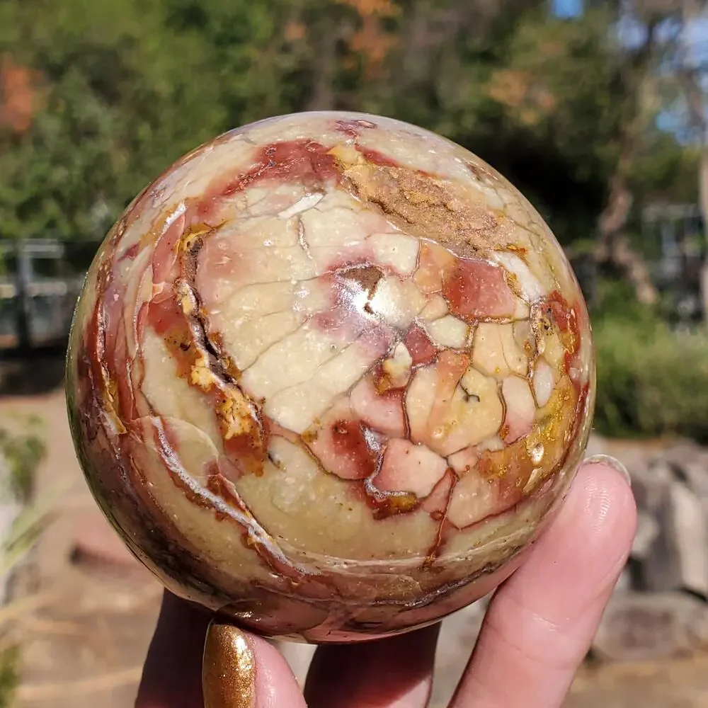 Pink Ocean Ibis Jasper Brecciated Sphere w/ Caves Druzy 458 grams 71mm
